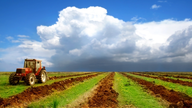 Unleashing the Power of the Holland Tractor: A Revolutionary Farming Marvel